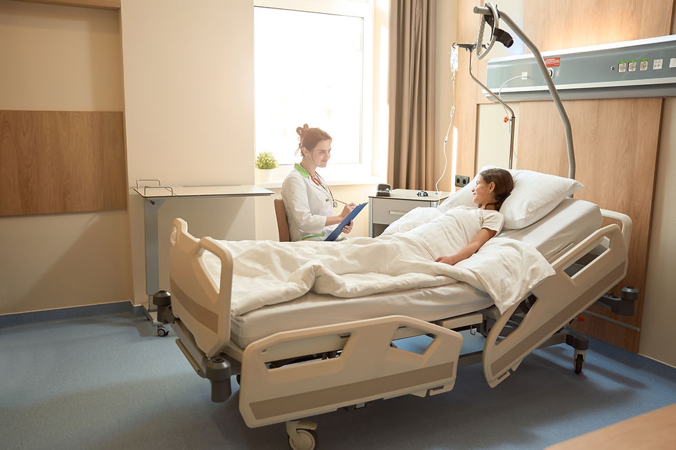 Patient with a doctor in a hospital bed