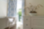 Pretty bedroom with full size bunk beds perfect for adults or children.