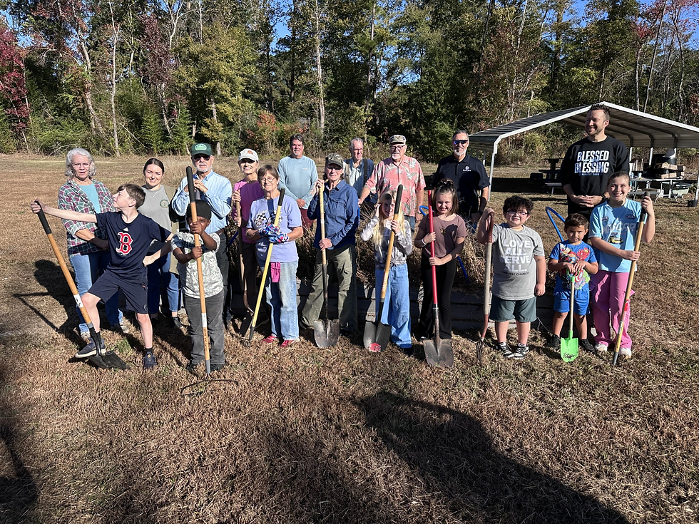 Volunteers of all ages turned out Friday morning to help break ground on the new Buzz & Bloom Sensory Garden at Harvest Church in Jasper. Photo courtesy of Laura Clark