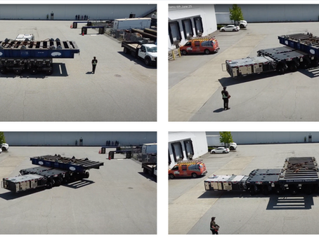 Self-Propelled Modular Transporter (SPMT) carrying a large industrial module at a port site