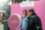 Eye-level view of a photo booth setup with colorful props