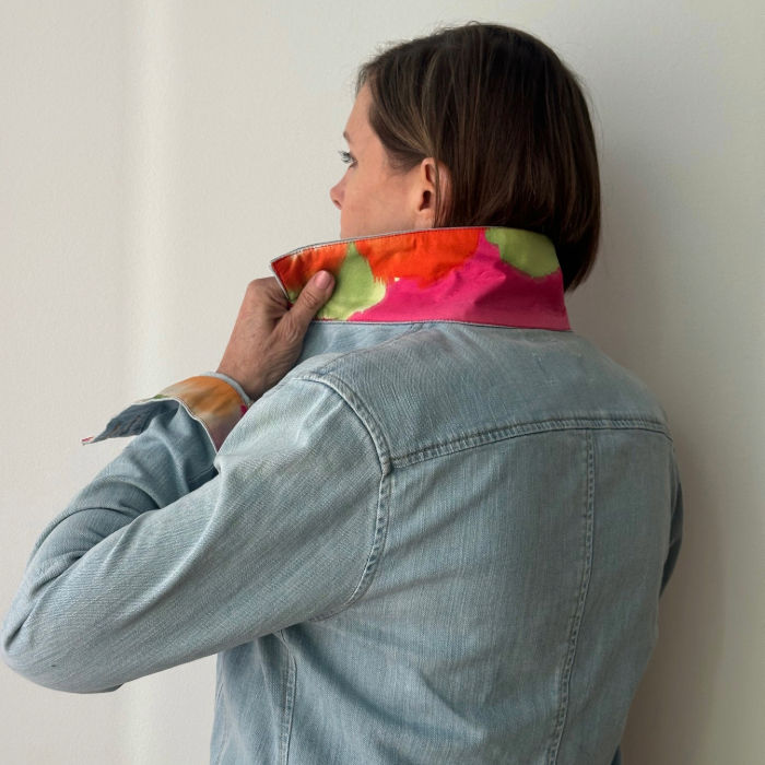 Thumbnail: A shows the collar of her jean jacket with a Ralph Lauren scarf sewn on the collar & cuffs