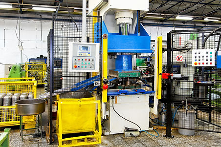 Hydraulic press heavy machine and factory interior.jpg