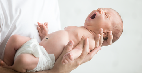 male-hands-holding-screaming-newborn_edited.png