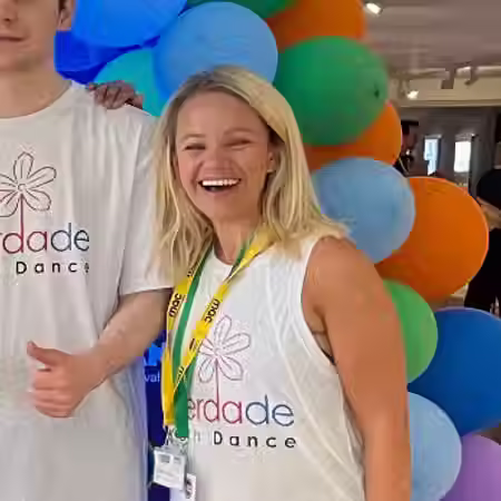 Heather smiles at an event