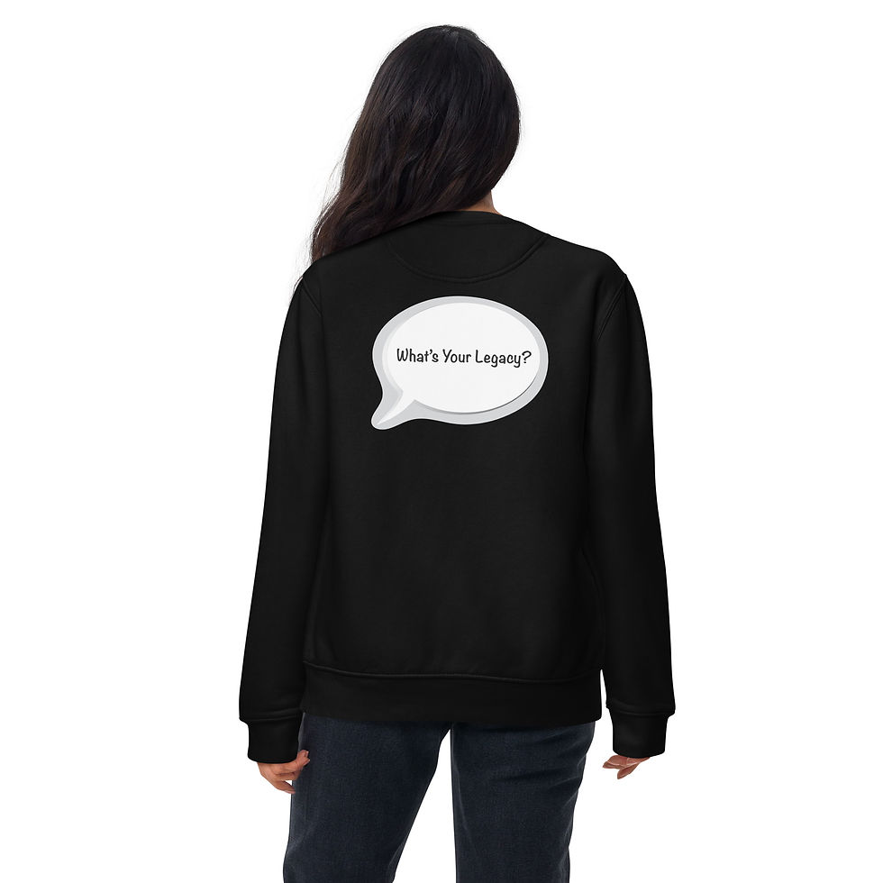 Thumbnail: Black long sleeve shirt with Discovering Legacy speech bubble logo branding. Back says "What's Your Legacy?" in speech bubble. Available in various sizes.