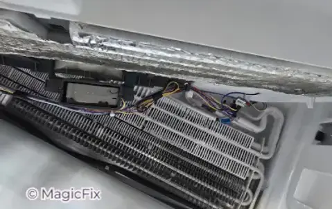 This LG refrigerator wasn’t cooling properly because of a refrigerant leak in the evaporator coil. We replaced the leaking evaporator coil and confirmed that the refrigerator returned to normal cooling.