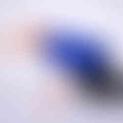 A person demonstrating proper abdominal bracing and foundational core stability exercises to prevent lower back pain.