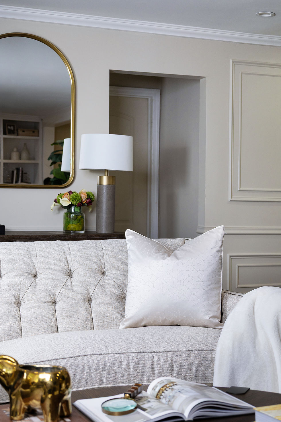 White linen pillow on beige sofa
