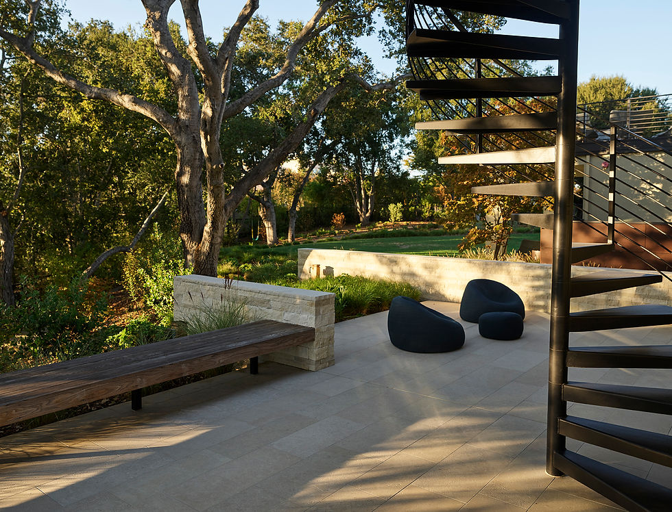 Photograph of a Limestone patio with spiral staircase