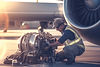 man-is-seen-working-jet-engine-tarmac-this-image-can-be-used-depict-aircraft-maintenance-a