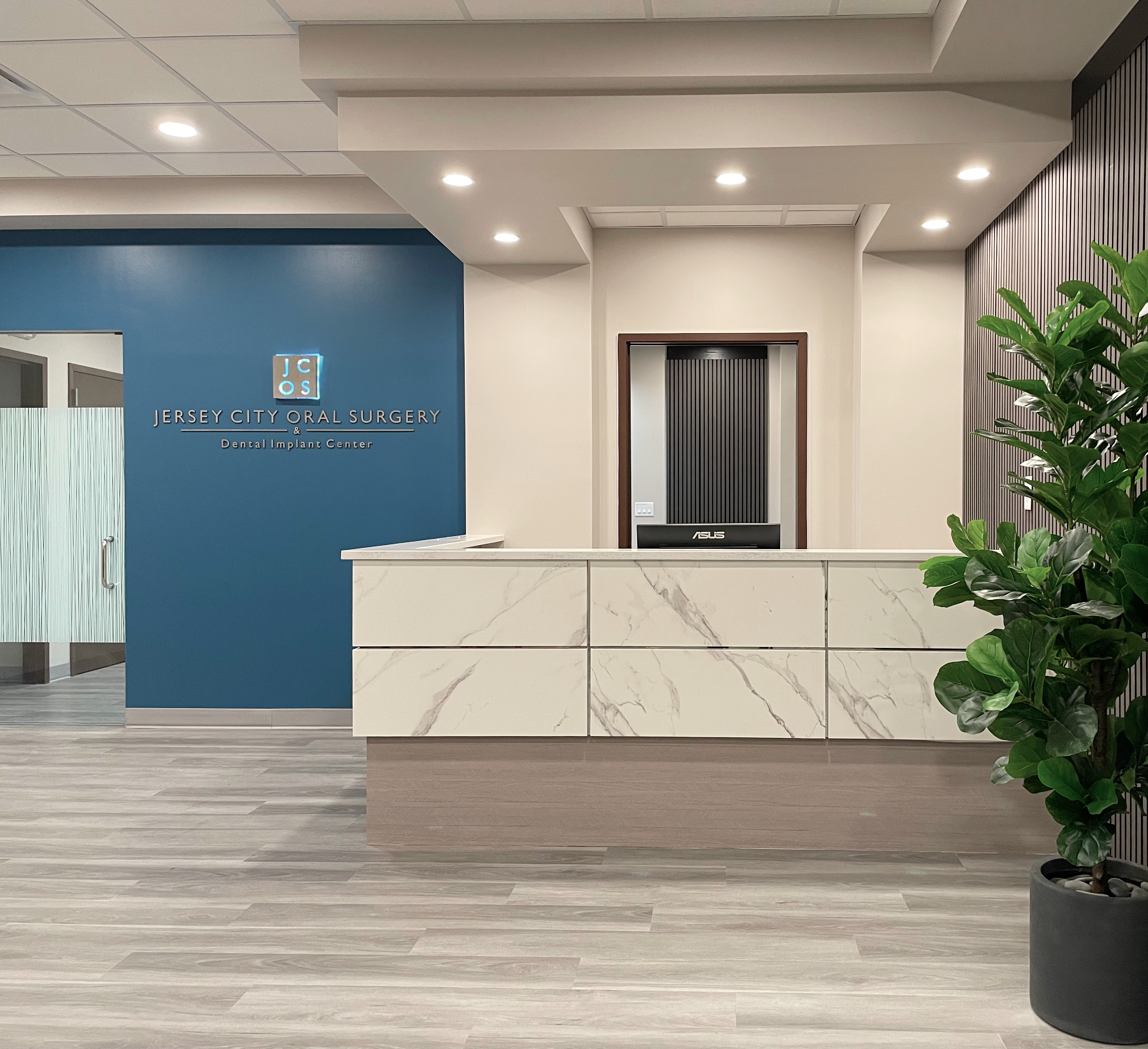 Jersey City Oral Surgery & Dental Implant Center - Logo