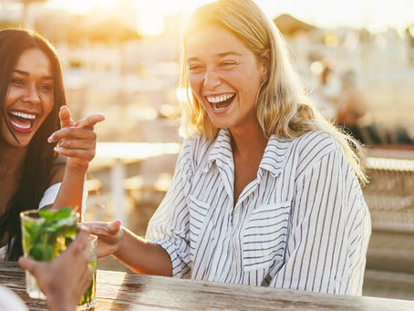 women laughing, having fun
