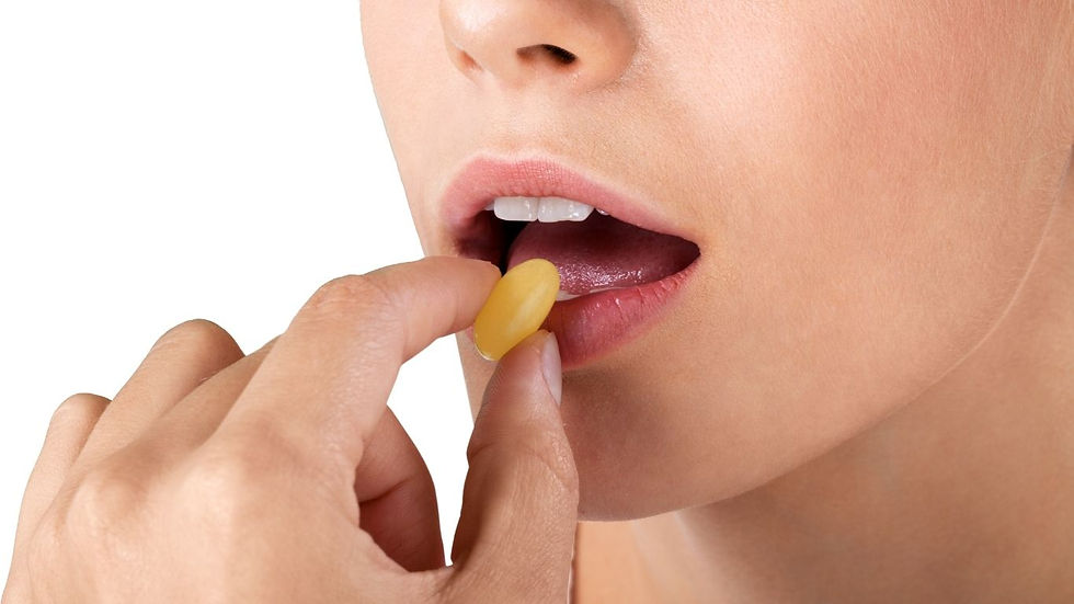 A woman taking supplements