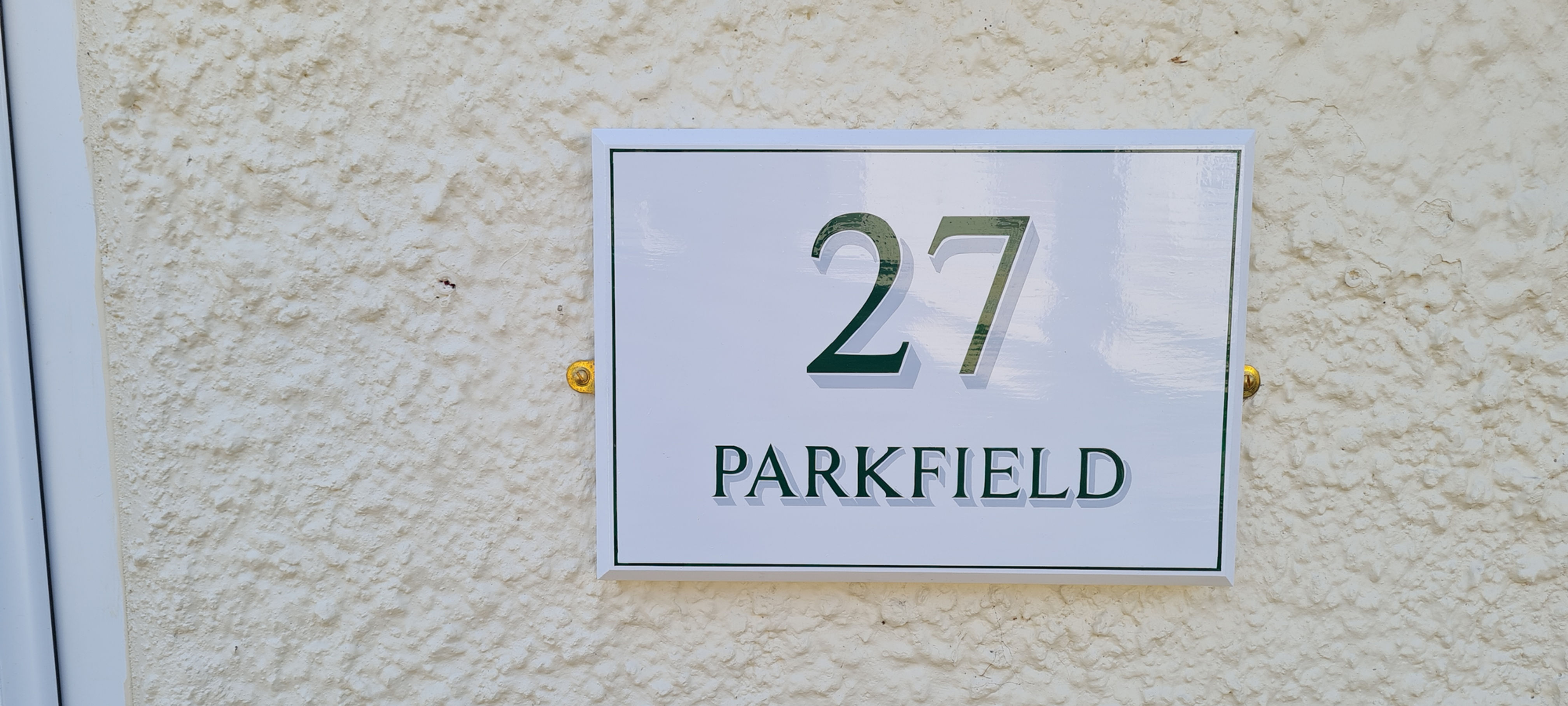 A4 size house sign with house number and road name