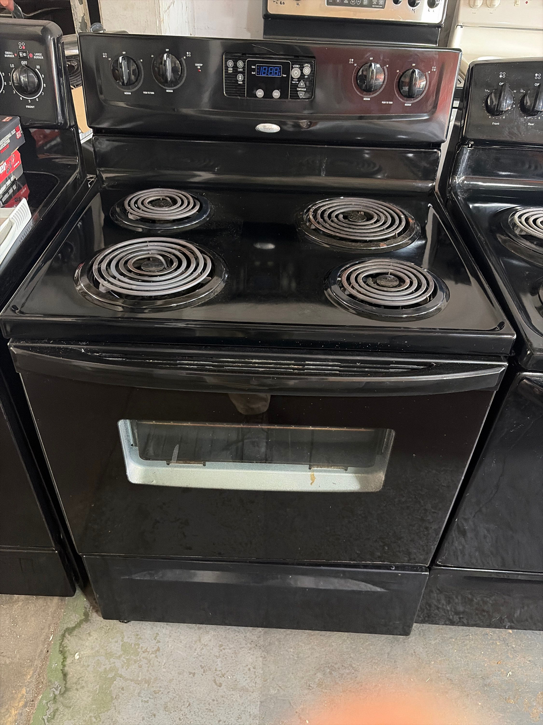 Whirlpool black coil top range 