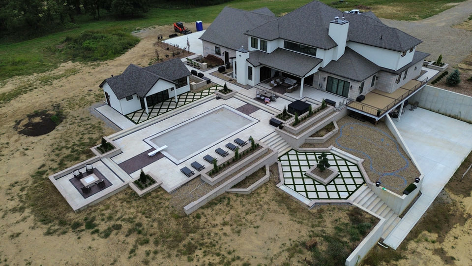 Custom outdoor living and pool project in Dexter, Michigan by Outdoor Impressions