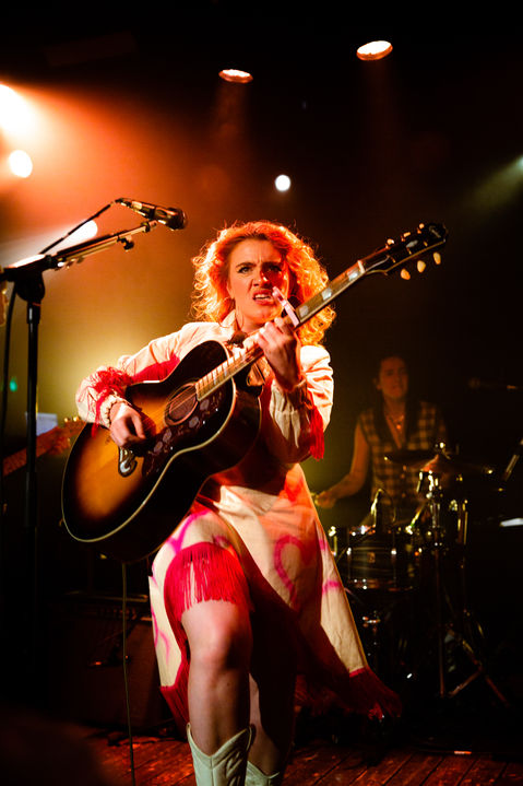 CMAT marches toward camera while playing at Omeara, London