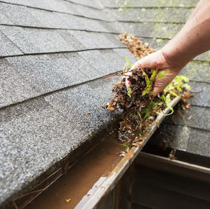 hand cleaning gutters