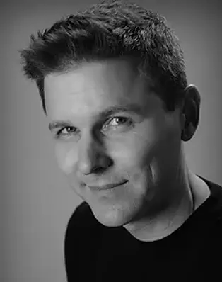 Danny Lux Headshot.webp