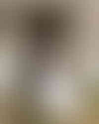 Couple kissing, wedding dress, suit, flowers, A glorious Farm Wedding in Aldbourne, Wiltshire, old door.