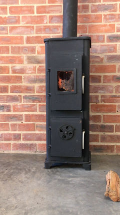 Crooks Goods wood burner warming a Boutique Apartment at The Old Mushroom Farm