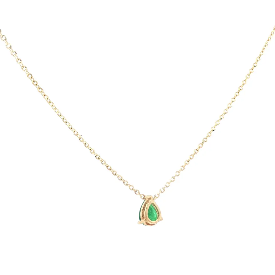Collar de oro con colgante en forma de lágrima y piedra verde. Boué Joyeros.