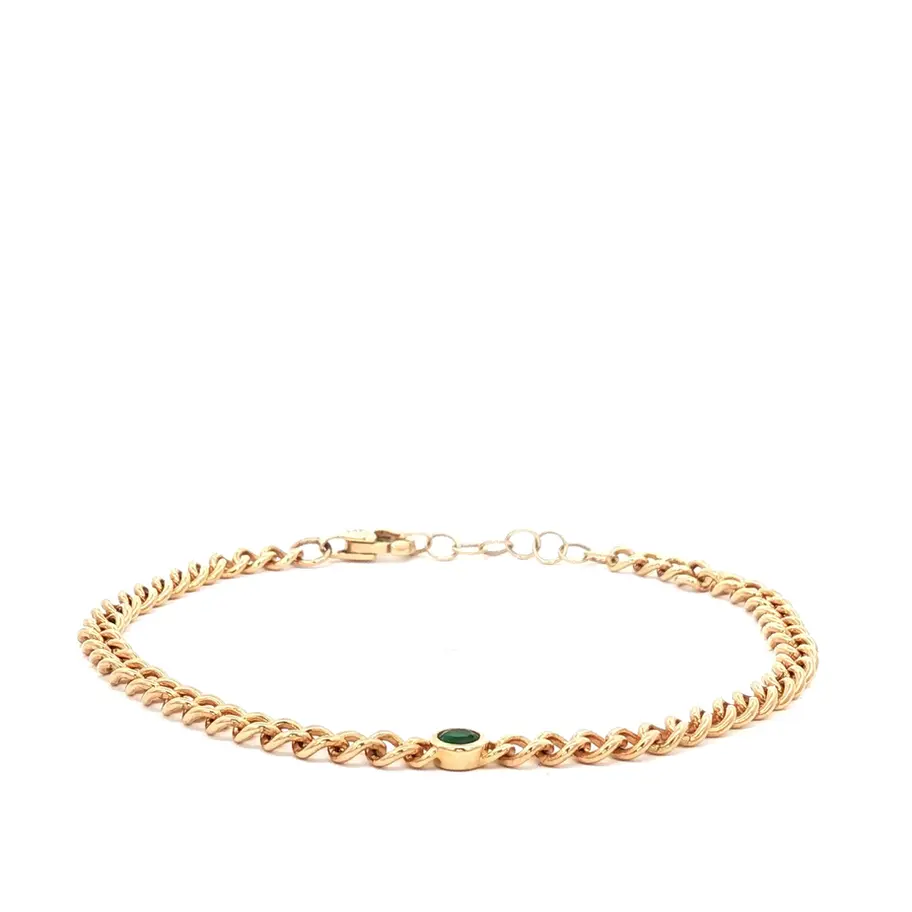 Pulsera dorada en cadena con esmeralda en su centro. Boué Joyeros.
