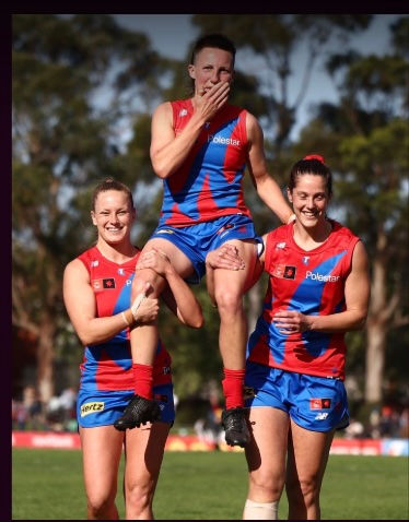 Paxy Paxman celebrates her 100th game with a win (PHOTO: AFLW.com.au)