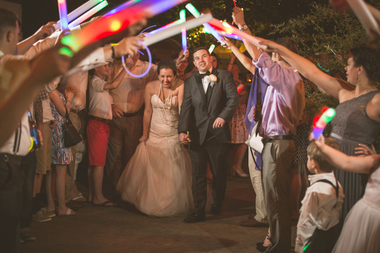 Bride and groom exit from reception in Columbia, SC wedding at Riverbanks Zoo