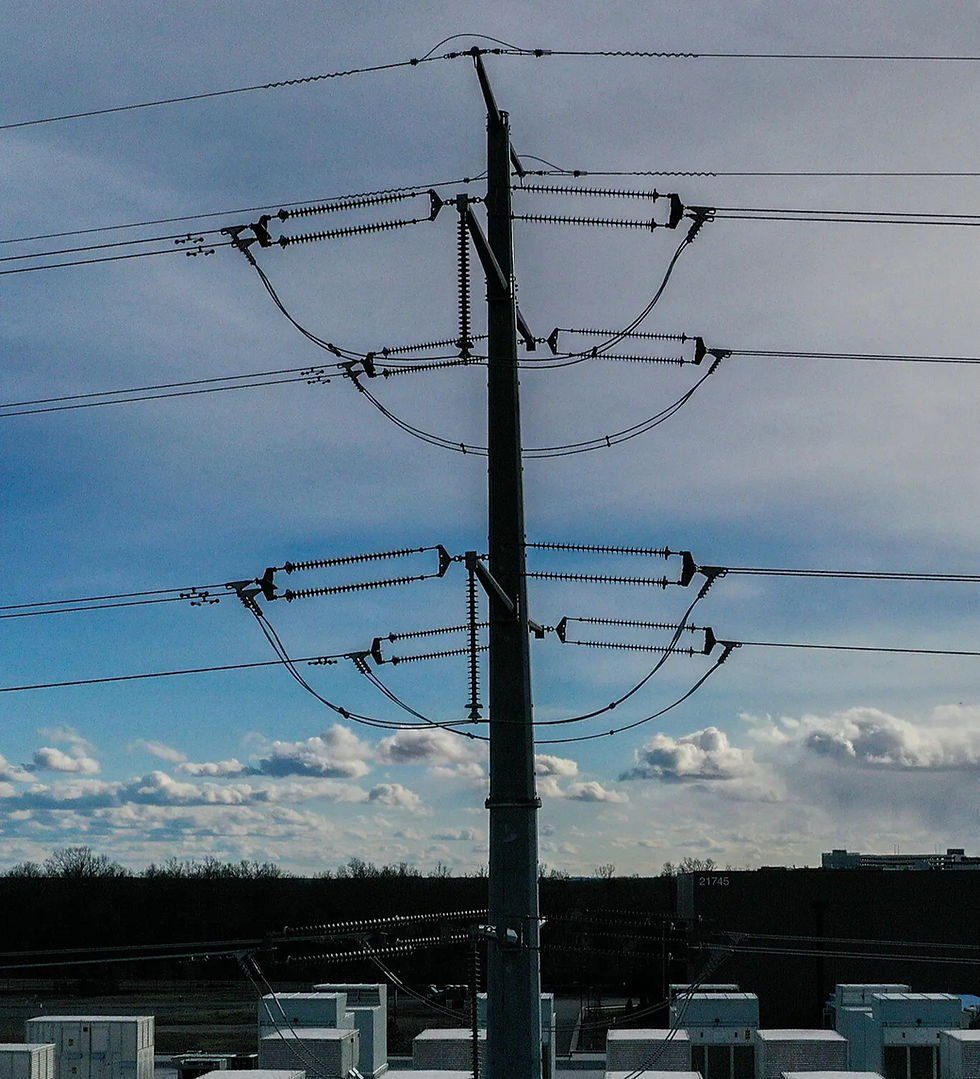 A transmission line running near data centers in Ashburn, Va. Credit...Nathan Howard for The New York Times