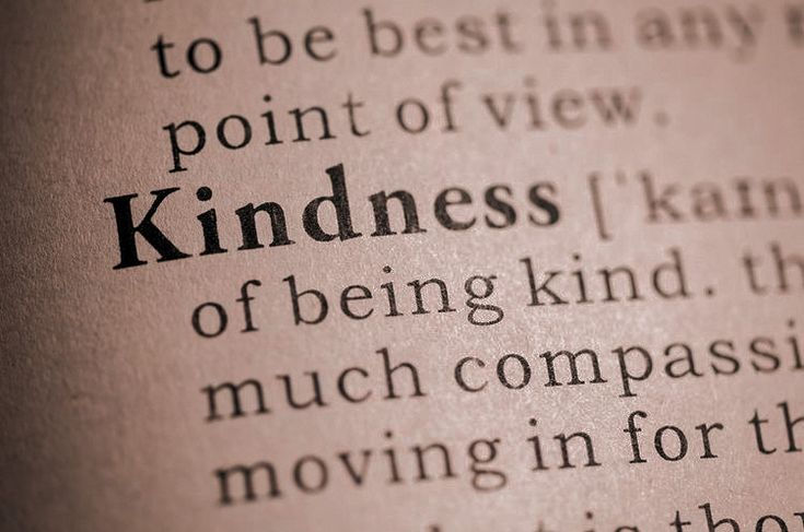 Close-up of a book page with written word like kindness