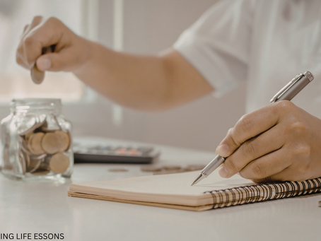 A person sitting with a notebook and jar of savings, planning SMART goals to begin saving for a big purchase with hope and confidence.