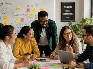 A group of coworkers collaborating casually around a shared project with smiles and sticky notes