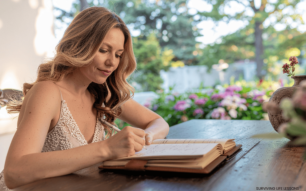 Writer journaling emotional thoughts in soft lighting