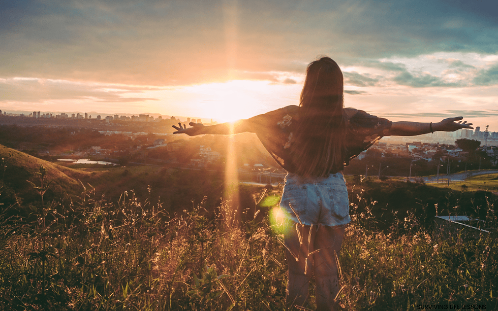 Person standing confidently in natural light, symbolizing living as yourself again