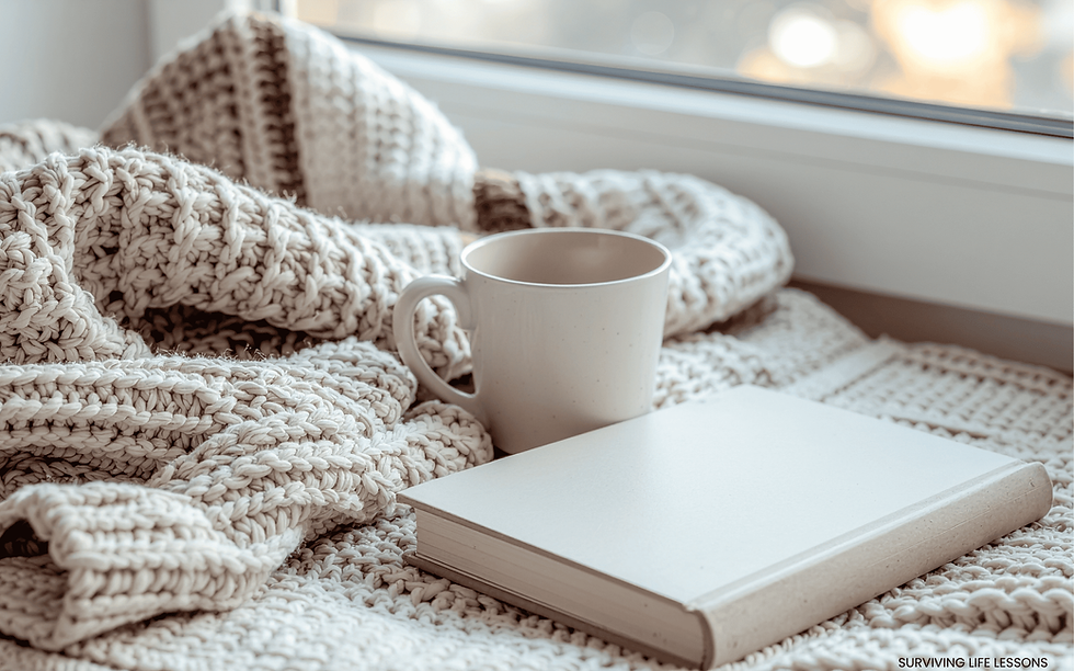 High angle view of a cozy space with a journal, coffee, and soft lighting