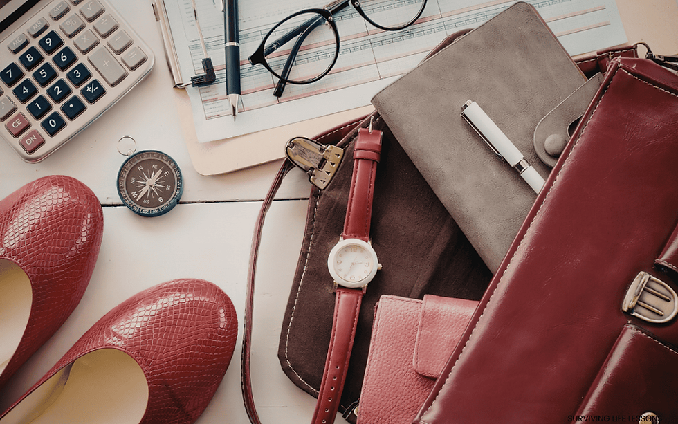 Person gathering small meaningful items, symbolizing reclaiming lost parts of self