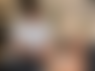 Glow and Unwind therapist using hand lotion on lady client