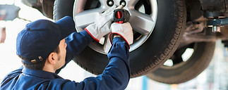 Mechanic Fixing Car