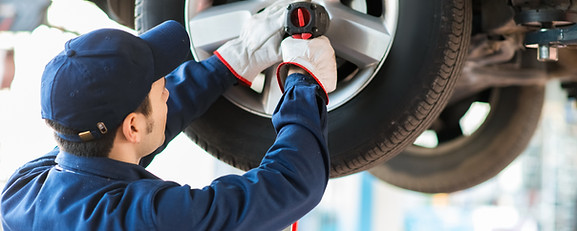 Mechanic Fixing Car