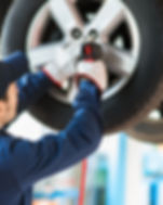 Mechanic Fixing Car