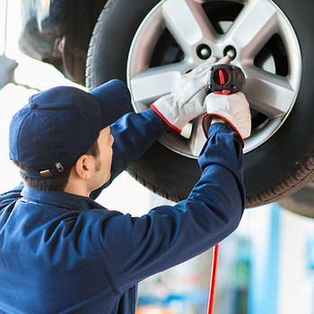 Mechanic Fixing Car