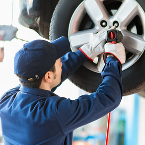 Mechanic Fixing Tire