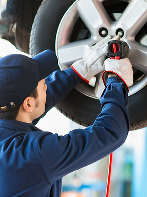 Mechanic Fixing Car