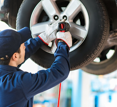 Mechanic Fixing Car