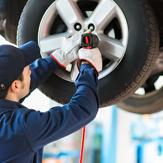 Mechanic Fixing Car