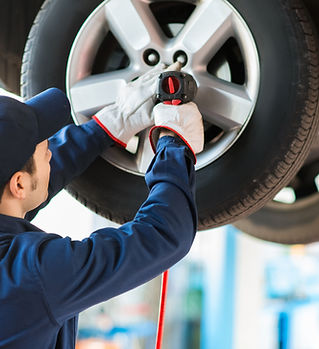 Mechanic Fixing Car