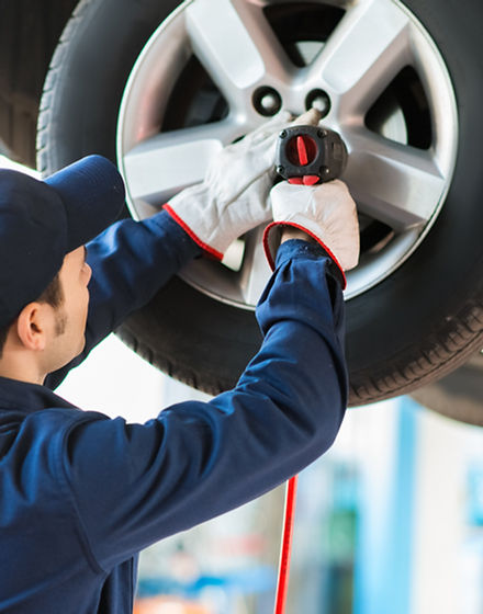 Mechanic Fixing Car