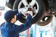 Mechanic Fixing Car
